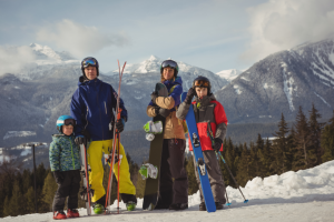 family-skiwear-standing-together-snowy-alps (Small)